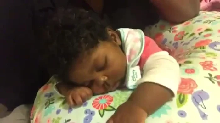 Position your baby comfortably (e.g., in a Boppy).