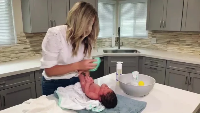 Wrap baby in a dry towel.