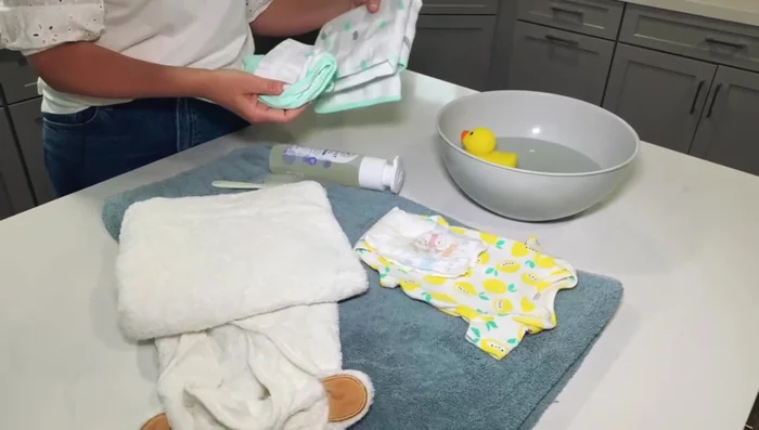 Lay baby on a bath towel.