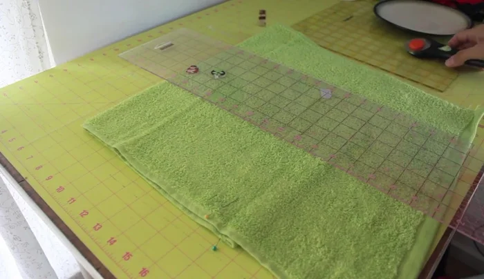 Optional: Use a round object (like a plate) to round the top of the hood for a cuter look.